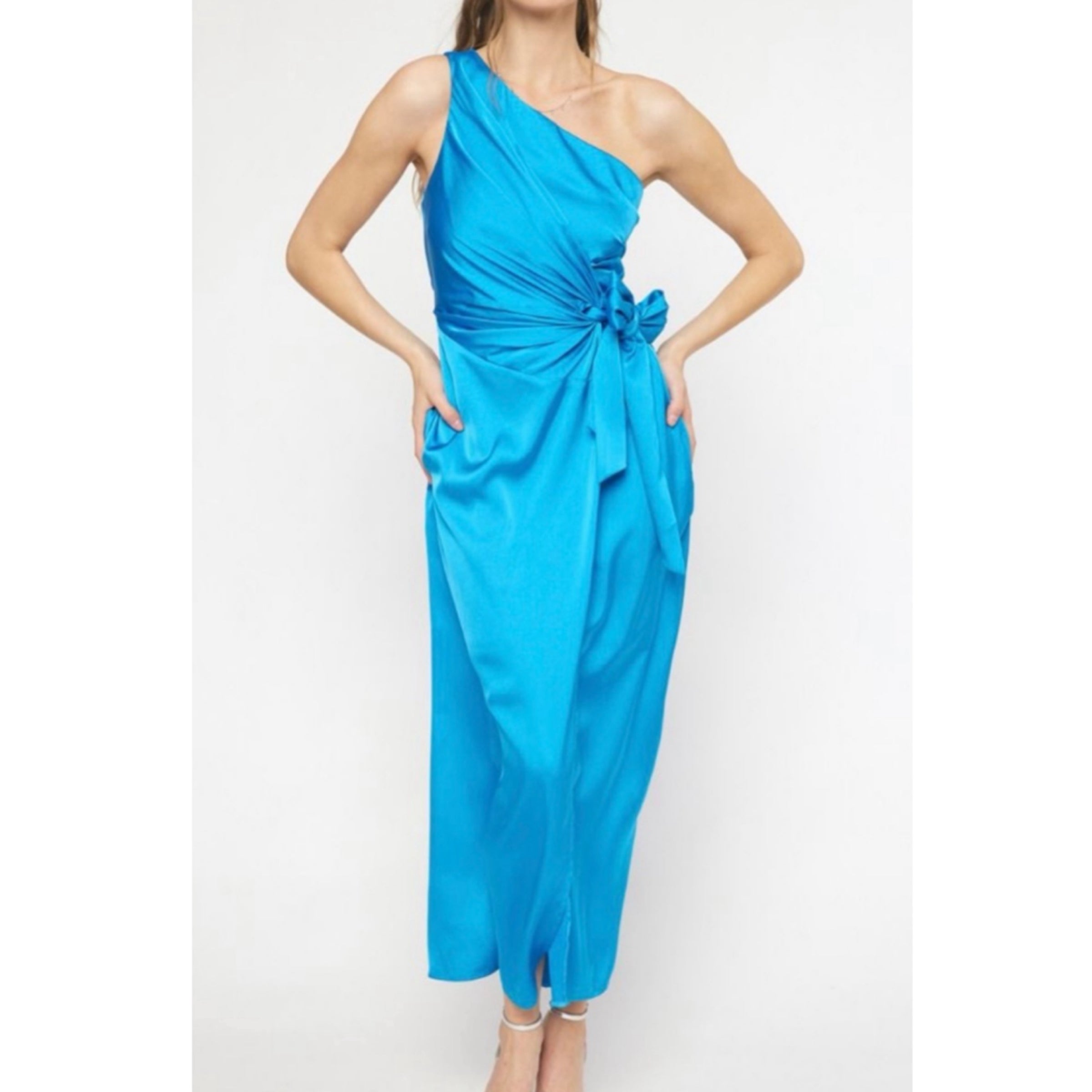 Satin one shoulder wrap front maxi dress featuring self tie at side.  Invisible zipper closure at side. Smocked waist at back. Lined. Woven.  Non-sheer. Lightweight. | Small Town Circle Clothing